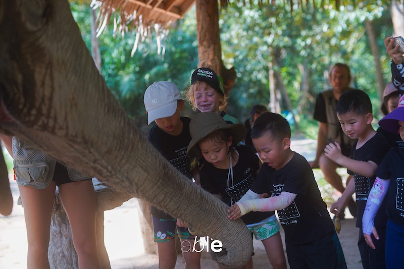 diverse group of kids at an Elephant Camp